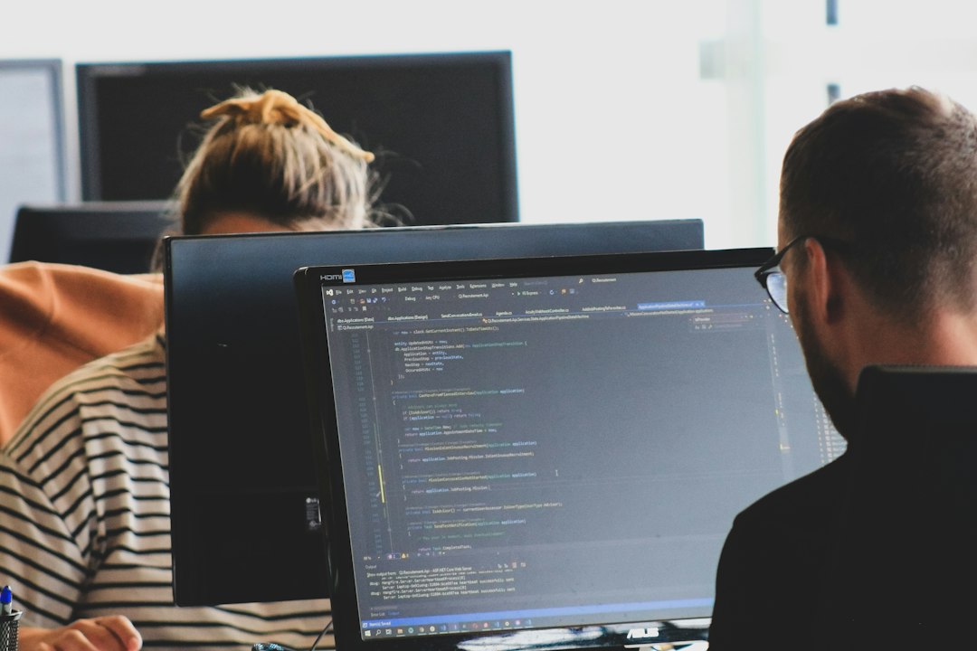 Developers working together on application integration and code