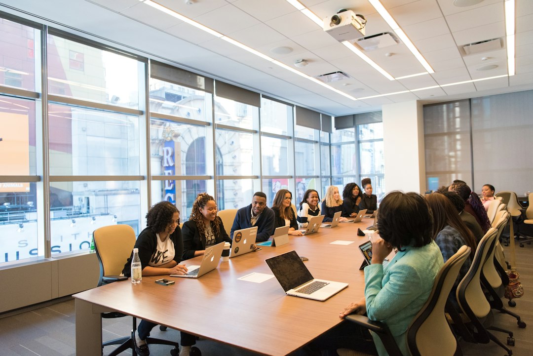 IT professionals collaborating with a business team