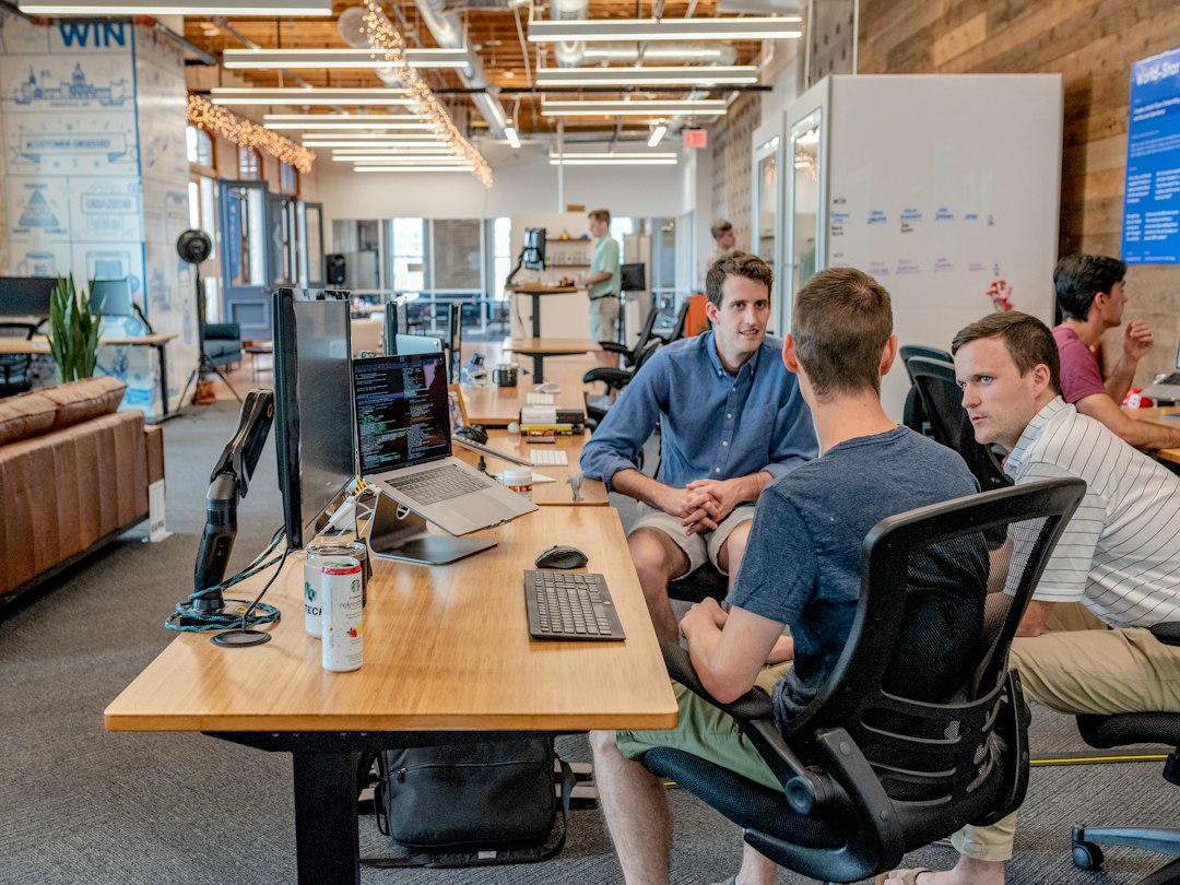 IT support professionals assisting business users